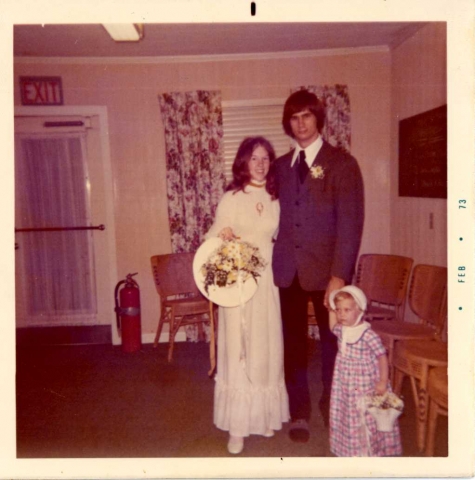 Donna Story & Scott Smith with my daughter Dawn (2-1/2) as the flower girl at Donnas wedding on 1-22-73.  What a wonderful day for two beautiful people.  Dawn was so good that day.  She wanted to be good for her Aunt Donna.